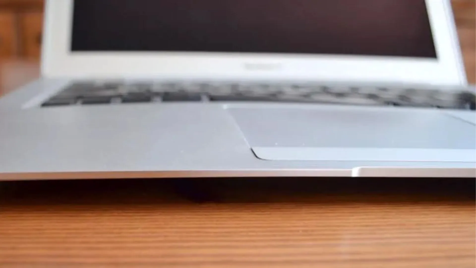 Laptop repair for swollen laptop battery and trackpad issue