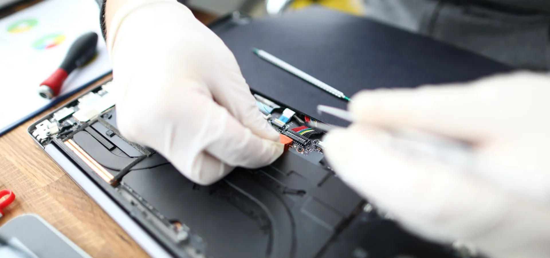 Reliable laptop repair technician working on software and hardware troubleshooting