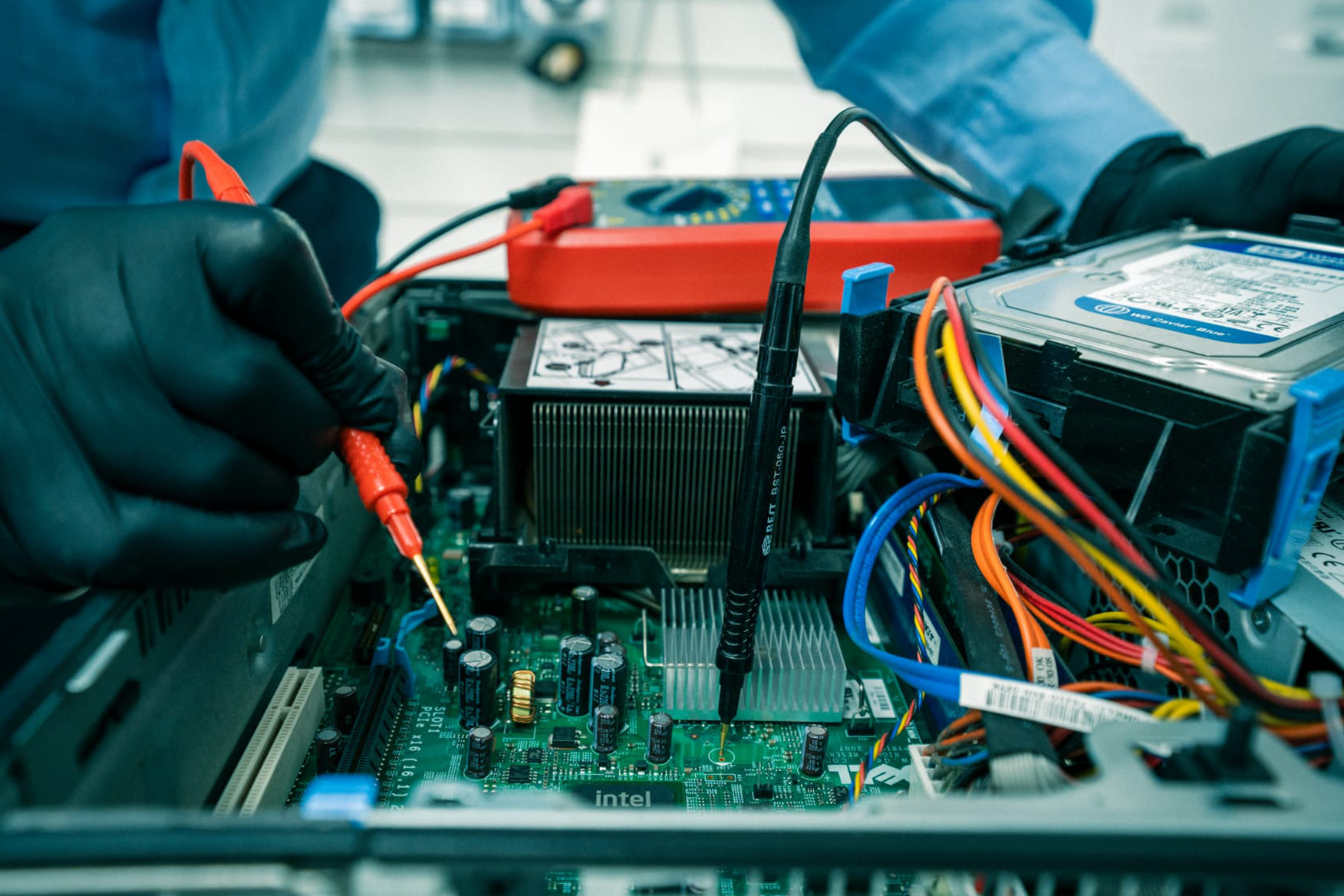 man-performing-macbook-pro-repair